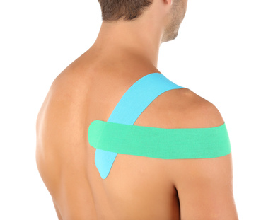 Kinesio-Taping in Leipzig – Schmerzreduktion & Stabilisierung für mehr Beweglichkeit
